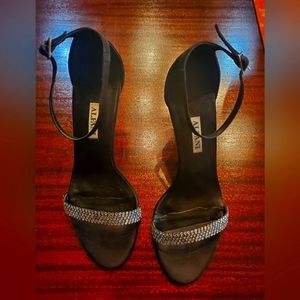 Black satin cocktail shoes with rhinestone band.